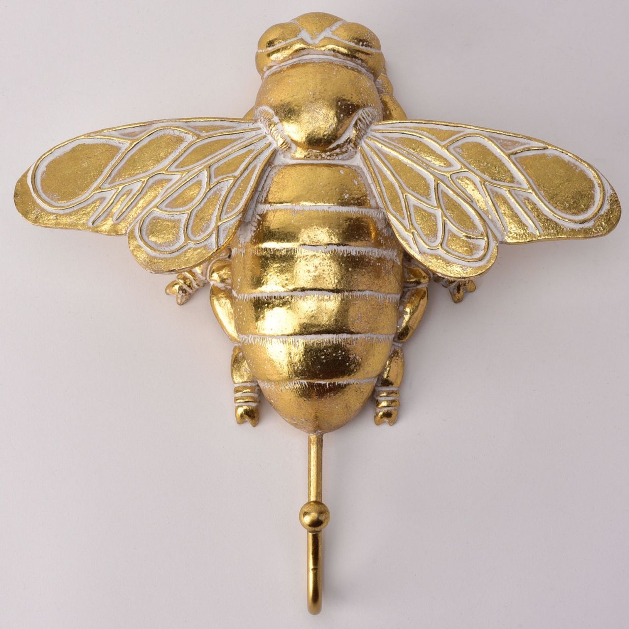 Bring some glamour to the home with this gorgeous golden bee wall hook.