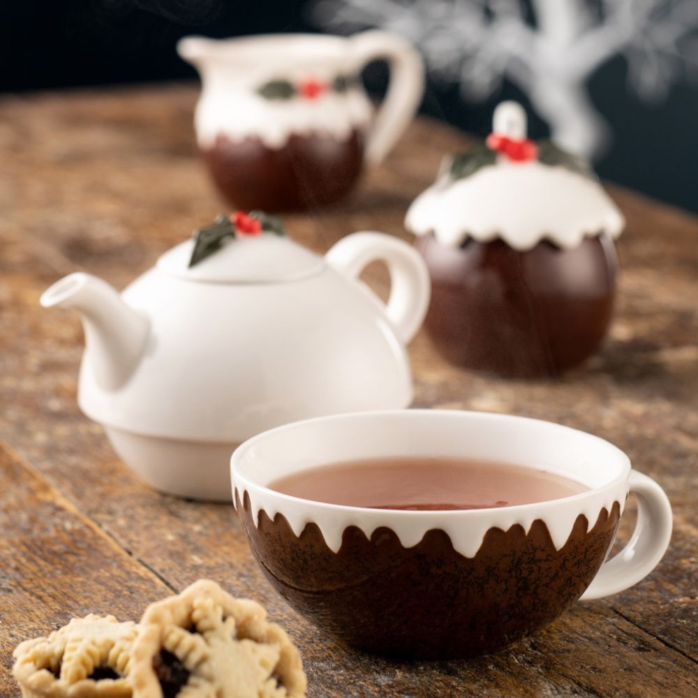 Our fun Tea for One is a new addition to our Christmas Pudding Tableware Collection. The teapot sits neatly on top of the teacup, which has holly painted inside the base. The stoneware range also includes a pair of mugs set, covered pot and jug set, salt and pepper set and lidded sweet jar.