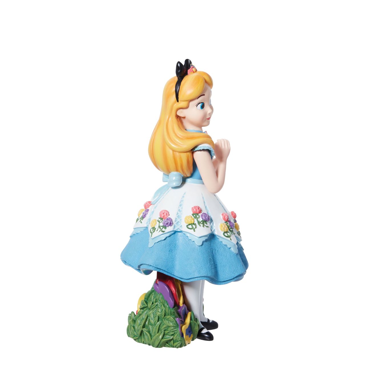 Celebrate Alice in Wonderland with Alice as she's never been seen before. Part of the Disney Showcase collection, Alice is the talk of Wonderland in her fashion-forward tea party dress. Her dress includes linen textures, iridescent paints, and sculpted 3D flowers to complete the look.