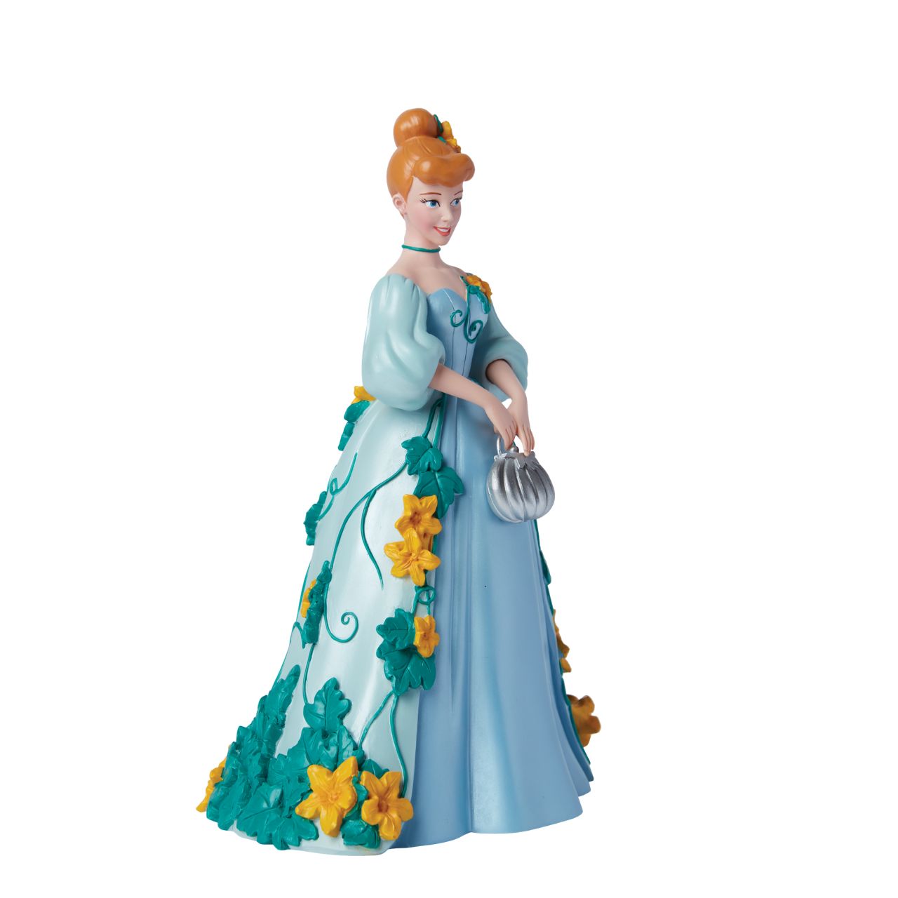 Part of the Disney Showcase Botanical collection, the Botanical Cinderella figurine sees Disney's iconic princess in her trademark blue ball gown adorned with bright yellow flowers and swirling green vines. Holding her silver pumpkin shaped handbag, she's ready to meet her Prince Charming.