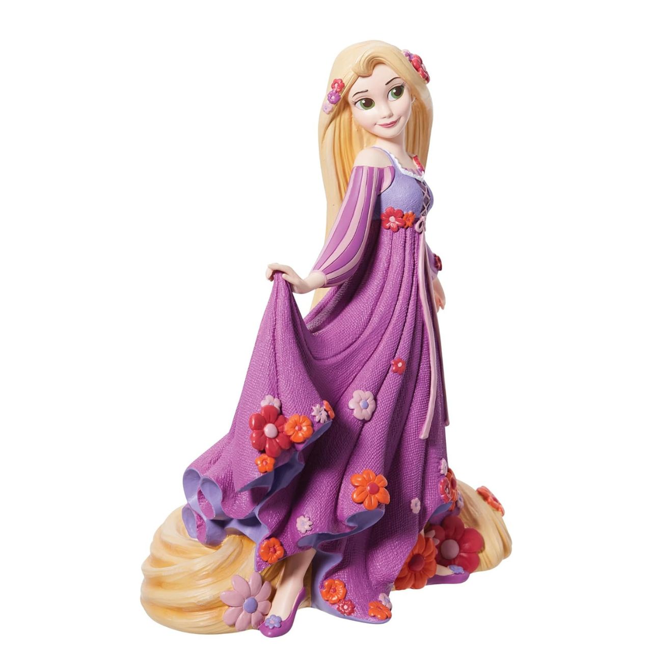 Disney Showcase shows a stunning new Botanical collection with Disney legends surrounded in 3D sculpted florals. No detail is overlooked, from a textured dress to sculpted florals, this figurine from Disney' animated film Tangled is made from cast stone.