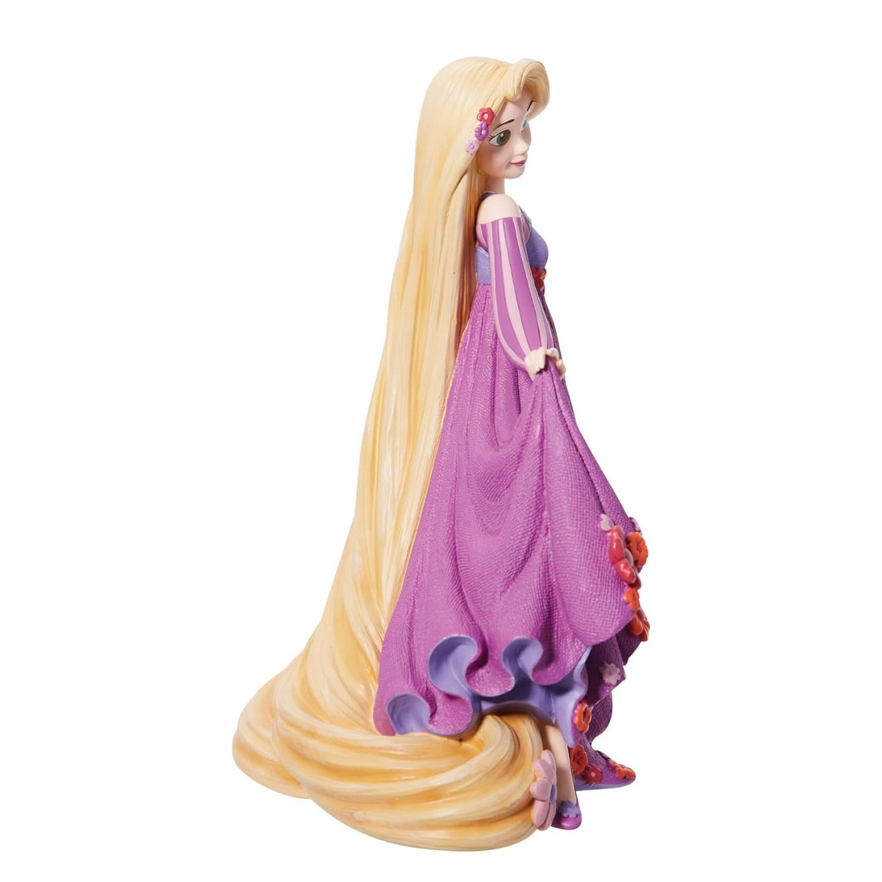 Disney Showcase shows a stunning new Botanical collection with Disney legends surrounded in 3D sculpted florals. No detail is overlooked, from a textured dress to sculpted florals, this figurine from Disney' animated film Tangled is made from cast stone.