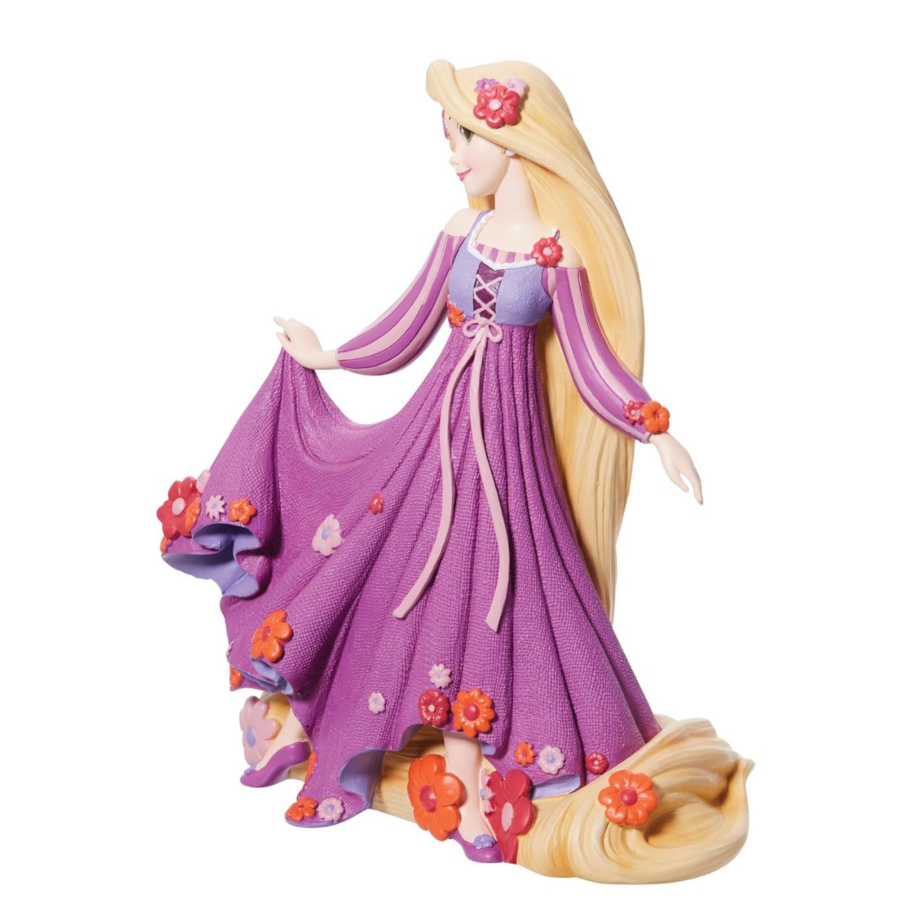 Disney Showcase shows a stunning new Botanical collection with Disney legends surrounded in 3D sculpted florals. No detail is overlooked, from a textured dress to sculpted florals, this figurine from Disney' animated film Tangled is made from cast stone.