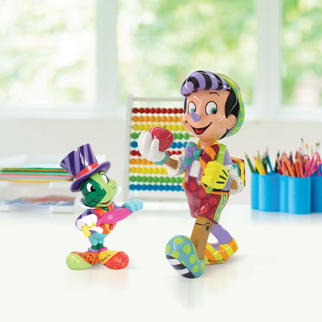 Among Disney's most treasured characters, Jiminy Cricket served as the conscience and guide to Pinocchio on his quest to become a real boy. Designed by Brazilian Pop Artist Romero Britto.