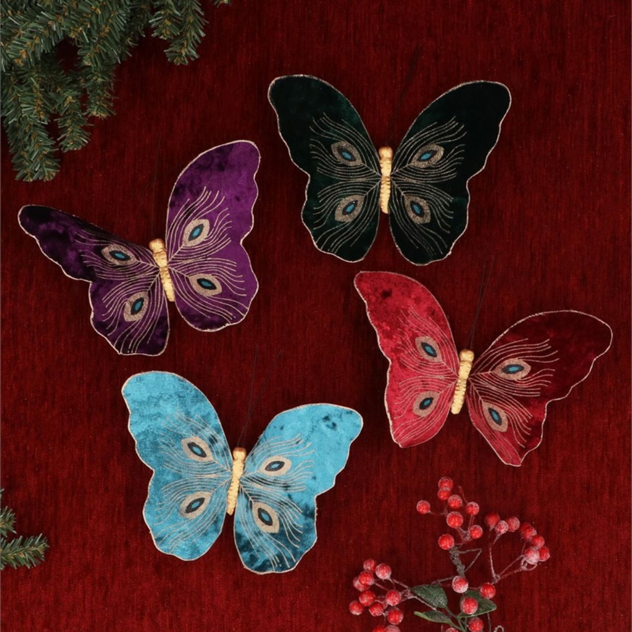 Add a touch of enchantment to your holiday decor with Gisela Graham's Diamante Butterflies Clip on Christmas Decorations. These fabric butterflies, adorned with sparkling diamantes, effortlessly clip onto your tree or wreath for a delicate and glamorous touch. Elevate your Christmas display with these beautiful and unique ornaments.