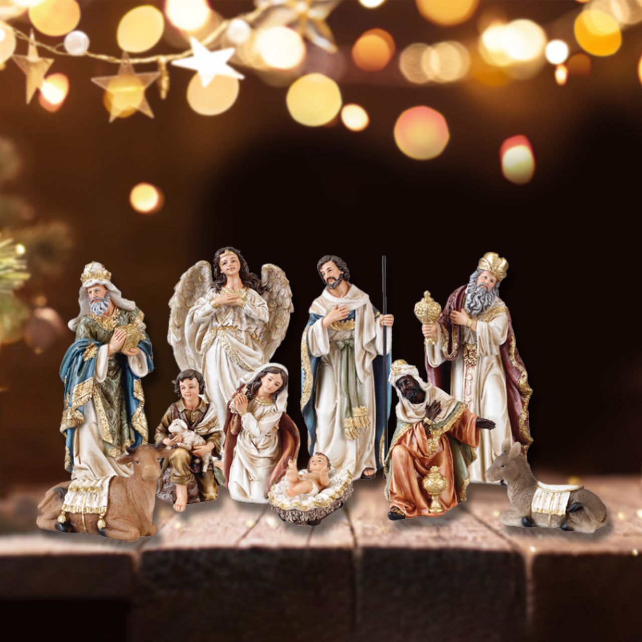 CBC Distributors Nativity Set with Gold Highlights 11 Figures 8 inch  Beautiful and delicately crafted and hand painted Nativity Sets. This scene of exquisitely designed figurines will form a stunning focal point in any home at Christmas. This thoughtful design features 11 resin pieces with gold highlights.