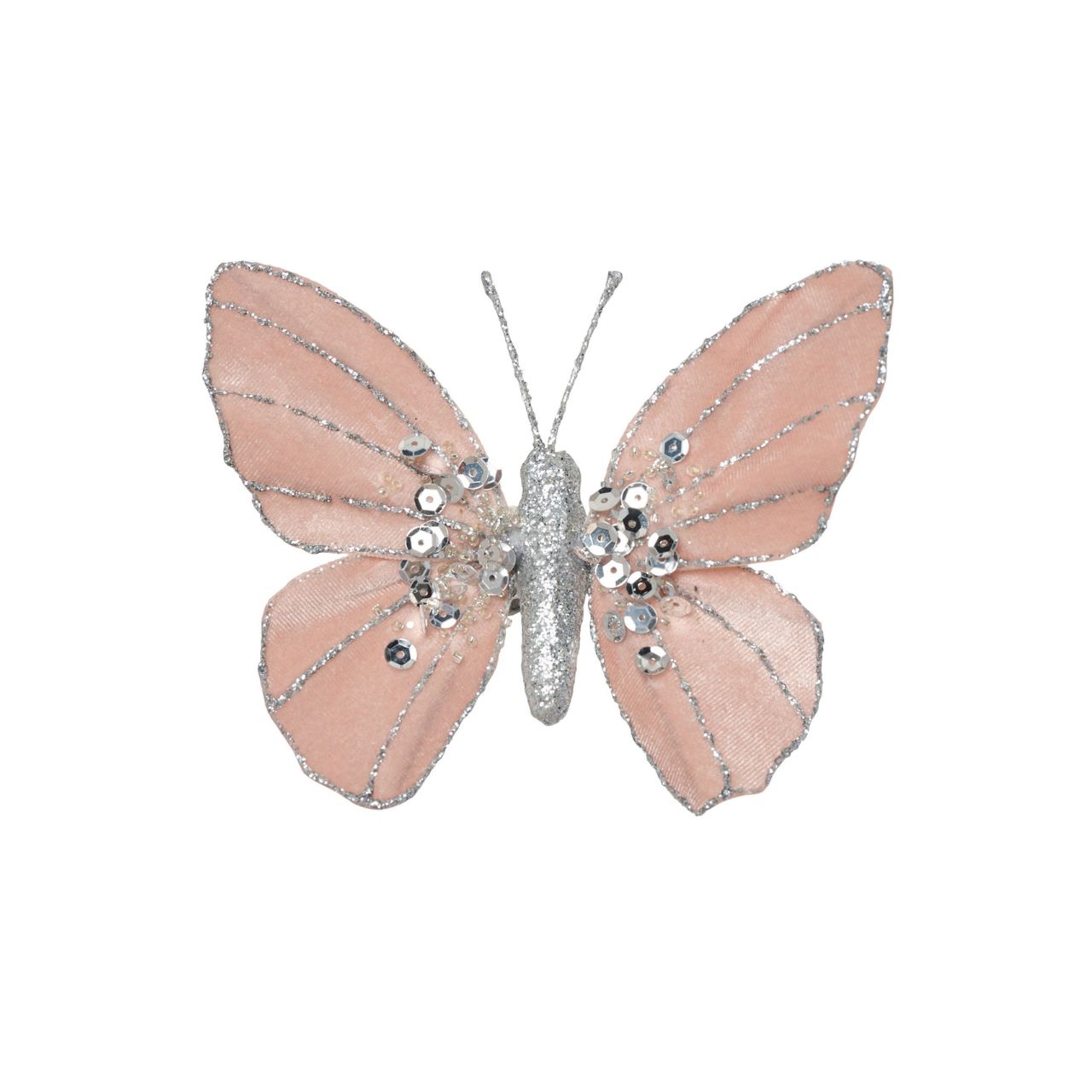 A Bellini Velvet Butterfly Clip in Blush. Beautifully crafted with an intricate sequin design, this stunning butterfly ornament will add a touch of whimsy to any space. The silver coloured sequins shimmer softly in the light, with delicate silver embellishments lacing the wings.