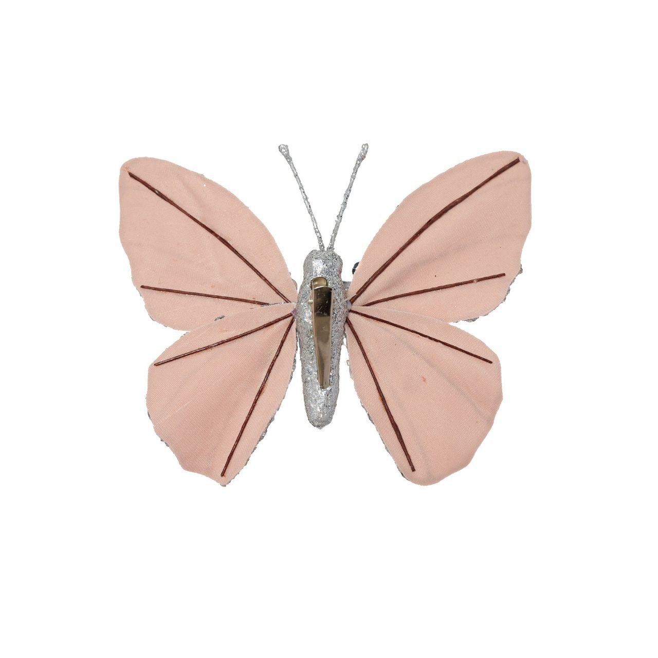 A Bellini Velvet Butterfly Clip in Blush. Beautifully crafted with an intricate sequin design, this stunning butterfly ornament will add a touch of whimsy to any space. The silver coloured sequins shimmer softly in the light, with delicate silver embellishments lacing the wings.