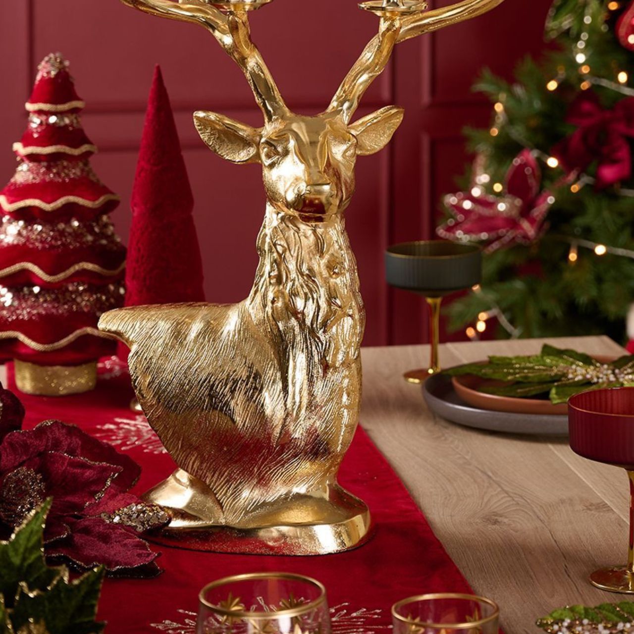 Embrace the festive spirit with The Seasonal Gift Co.'s Flocked Resin Christmas Tree. Crafted from resin, the tree is elegantly flocked in red, creating a vibrant and festive centrepiece.