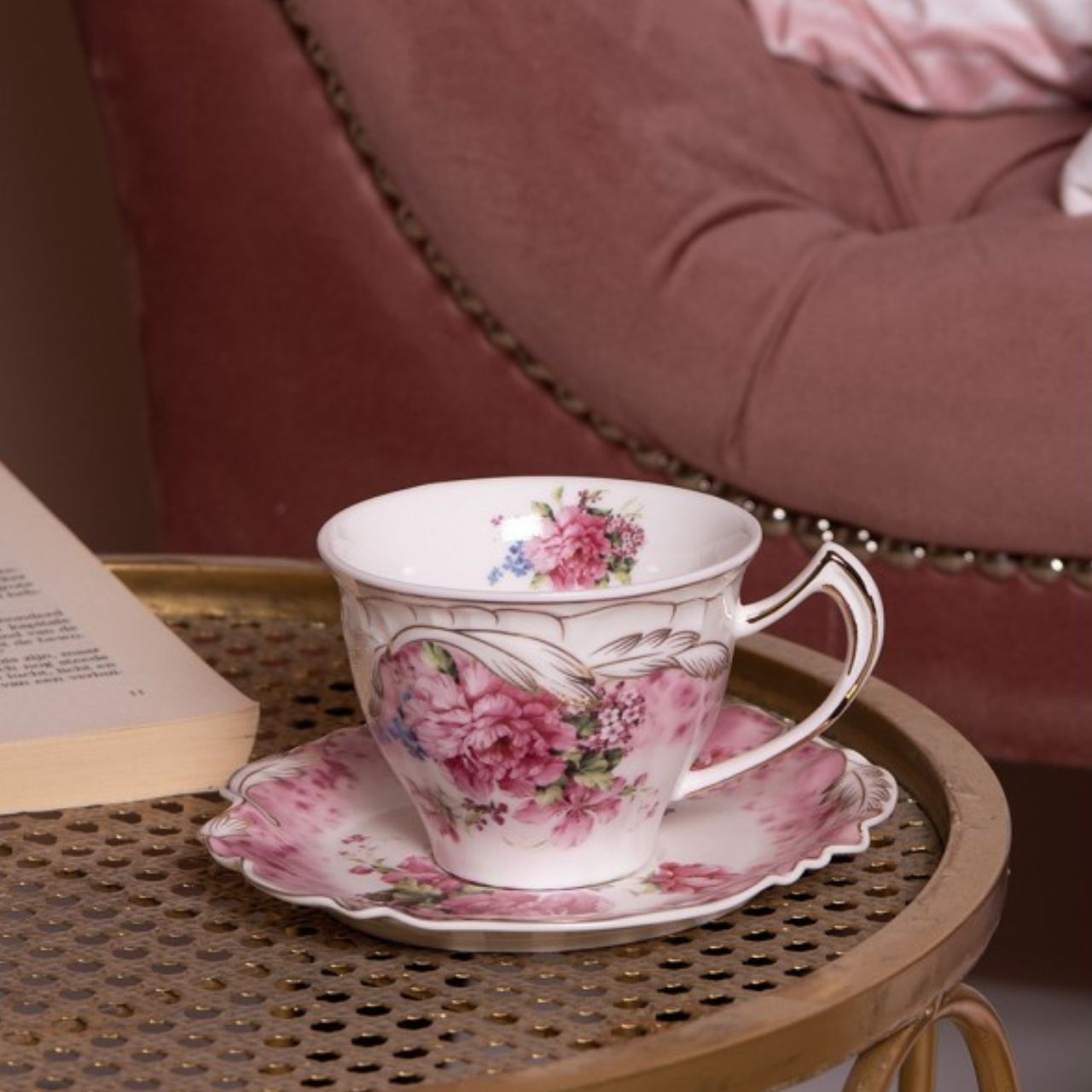 Enjoy a special cup of tea or coffee with the Clayre &amp; Eef Classic Pink Flowers Cup and Saucer. Carefully crafted from quality materials, this unique cup and saucer combination is decorated with charming pink and white floral motifs for a timeless, traditional look. Whether you're hosting guests or sipping a cup of tea solo, let the Classic Pink Flowers Cup and Saucer be your tasteful choice.