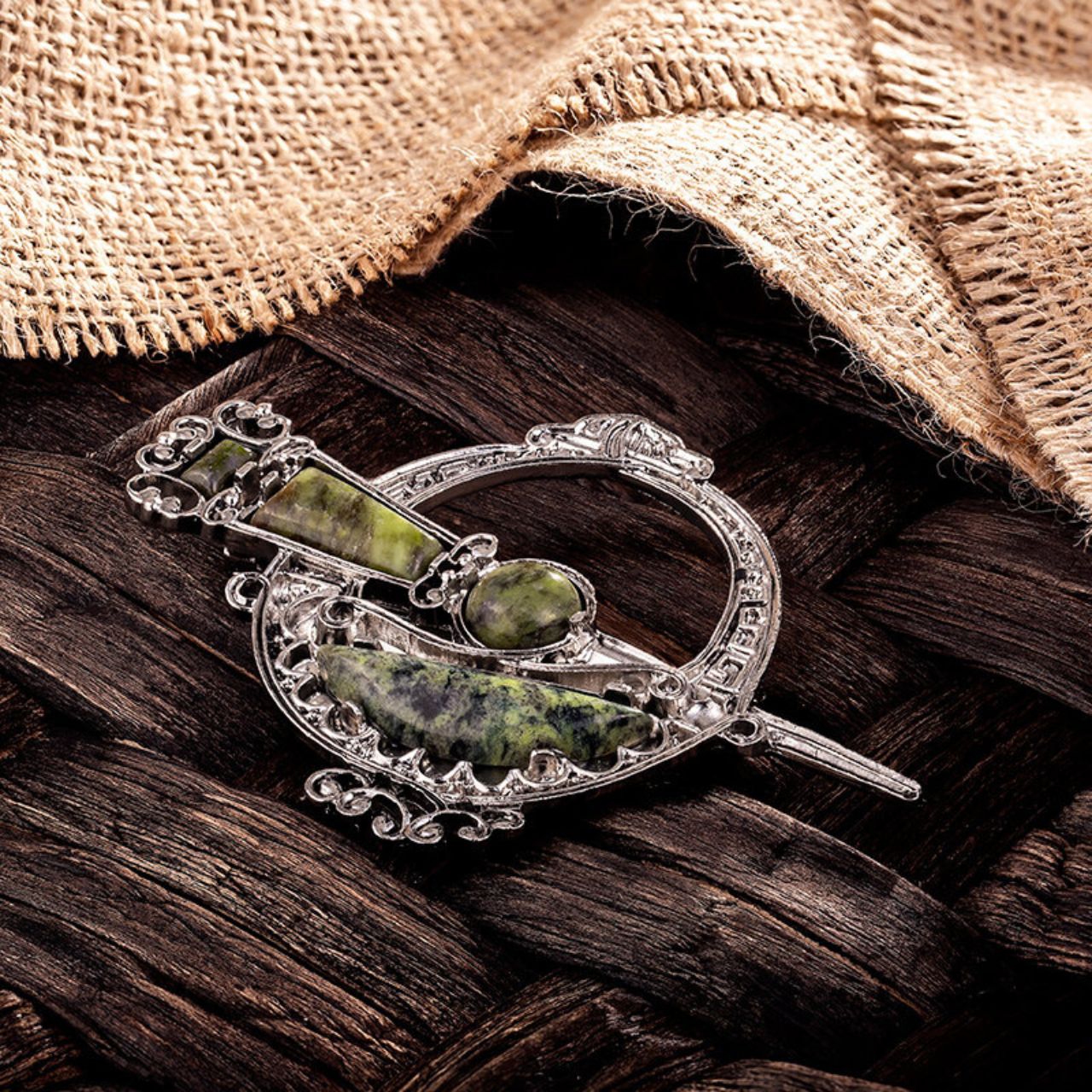 This beautiful rhodium plated brooch is made from Connemara marble, a unique stone featuring a range of green colour tones and known as “Ireland’s gemstone”. As no pieces of marble are ever the same, each piece of our jewellery created using this stone are completely unique. The Tara brooch is named after the hill of Tara and dates back to 700AD and the era of Bronze age craftsmanship.