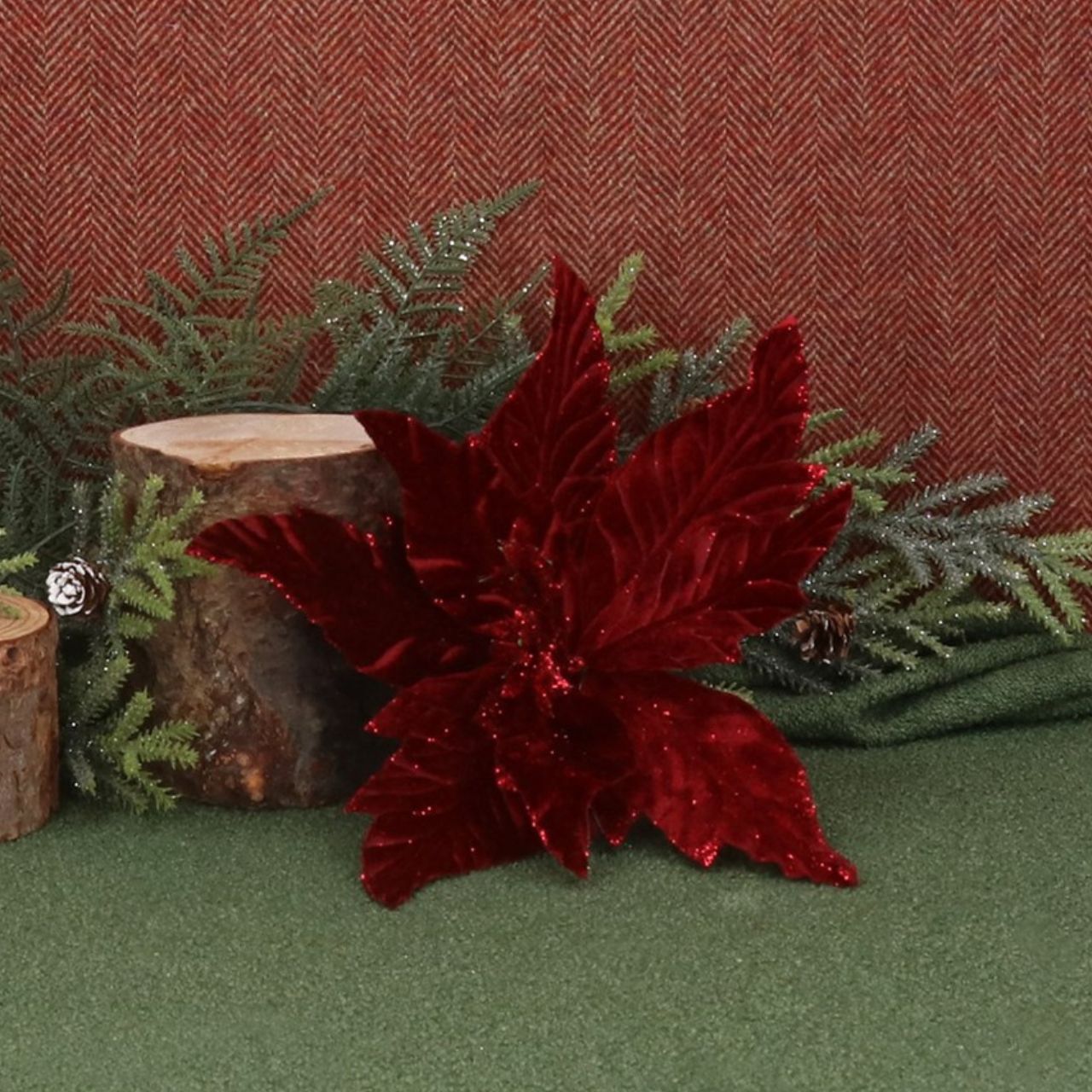 Expertly crafted by Gisela Graham, this Dark Red Poinsettia Christmas Clip on Flower adds a touch of elegance to your holiday décor. Made with durable materials, its vibrant colour and realistic design will bring the joy and beauty of a poinsettia to your home without the worry of wilting.