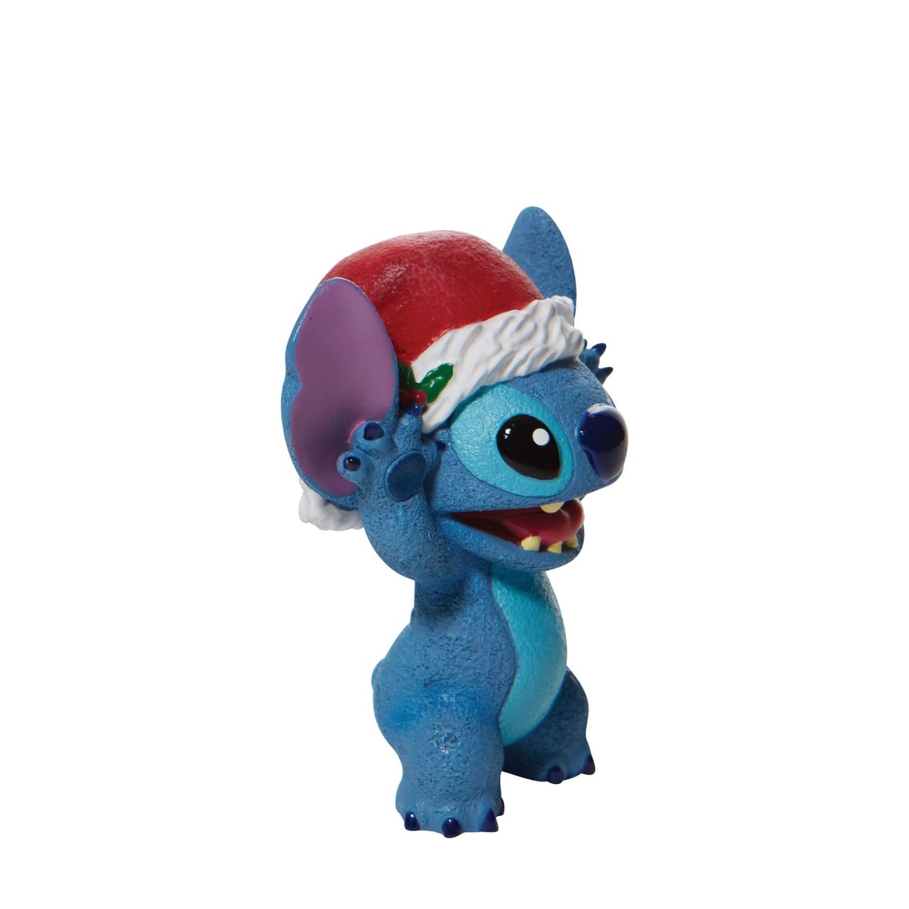 Department 56 Christmas Stitch Figurine  Everyone's favourite alien, Stitch, smiles jollily in his Santa hat this Christmas. With a bushel of holly tucked in his cap, he's ready for merry mischief. Hula through the holiday with Lilo's most festive friend and spread love to your Ohana.