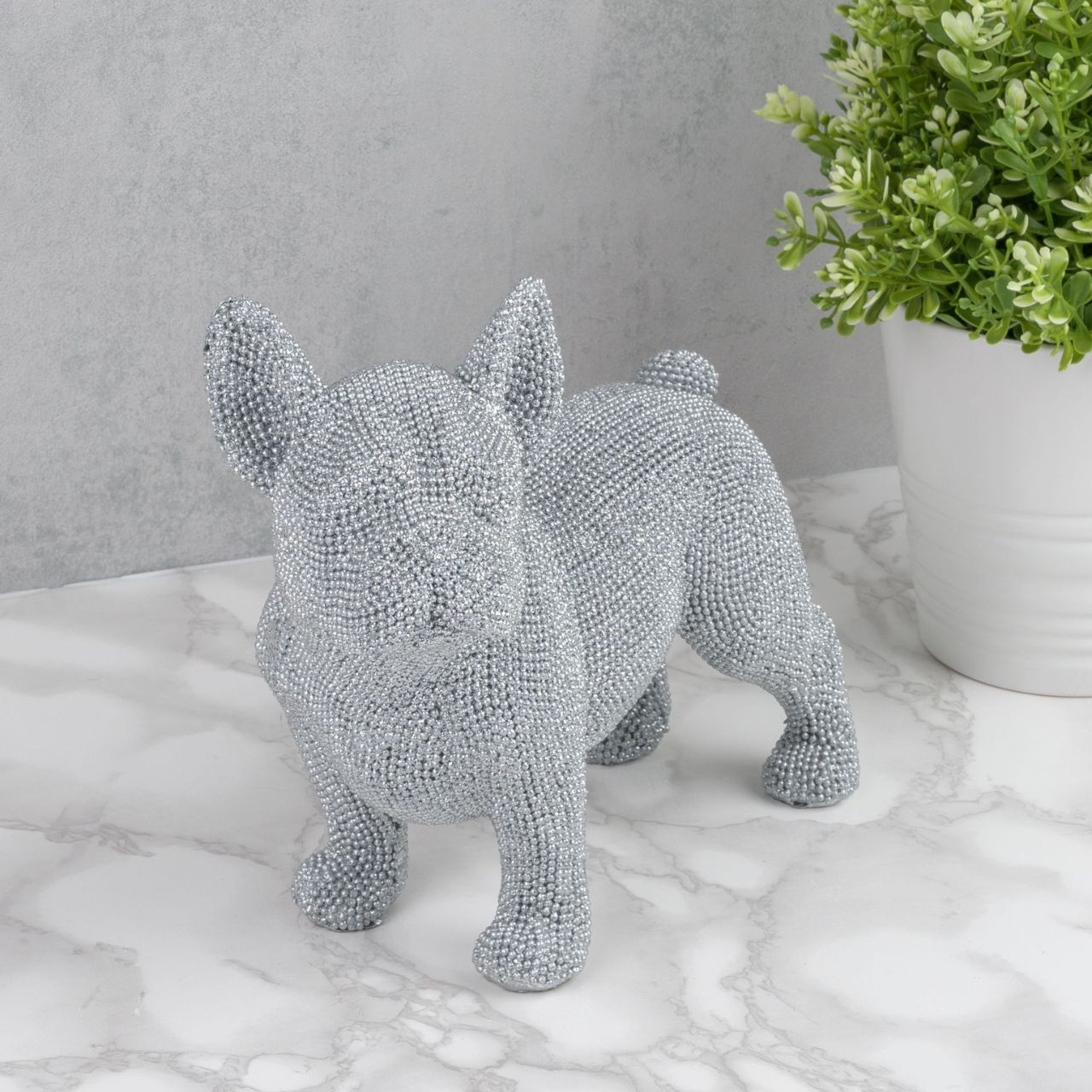 Bring a touch of glitz and glamour to the living space with this diamante look silver Bulldog ornament. From the Silver Luxe collection by HESTIA - unparalleled glamour, style and elegance in contemporary home and gift.