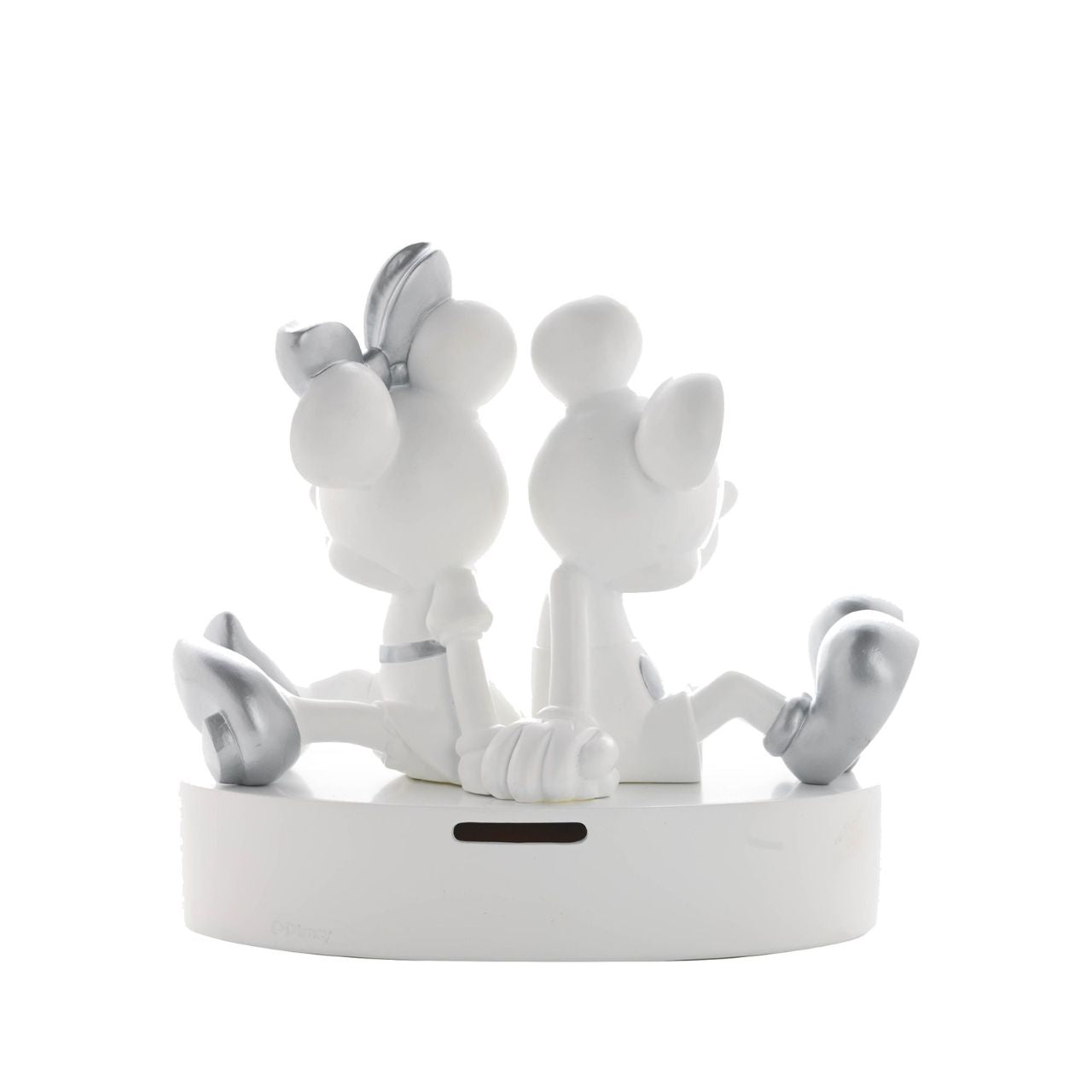 This substantial money box features the iconic pair holding hands back-to-back. This resin sculpture is a contemporary styled, statement figurine. The money slot is located at the back, with an easy-to-remove rubber plug on its base for retrieval of funds.