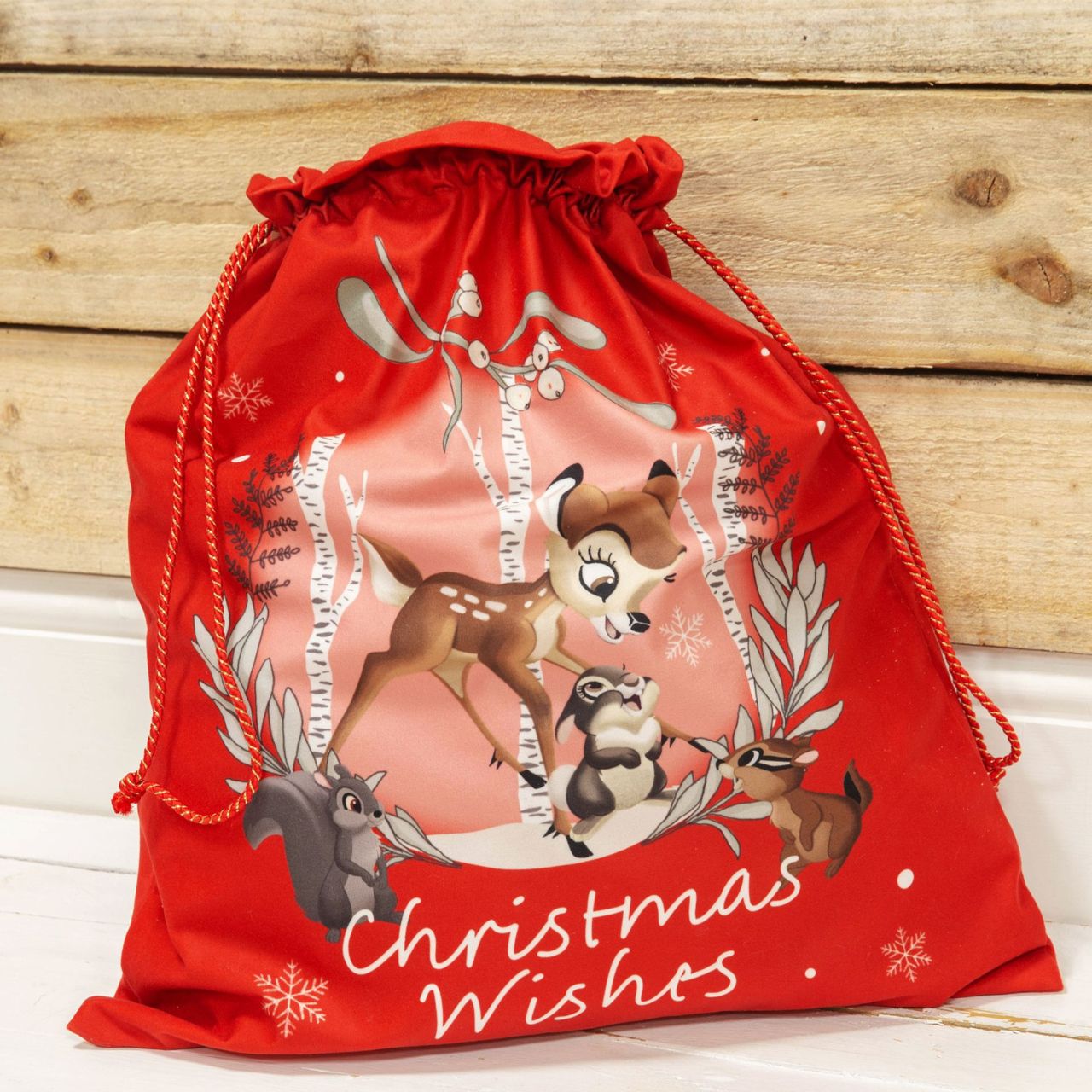 Make sure Santa has somewhere special to leave all those goodies with this luxury red velour fabric Bambi Christmas gift sack. From the Bambi Enchanted Forest Christmas collection by Disney - the magic of one of Disney's most timeless tales brought to magical Christmas gifts and decorations.