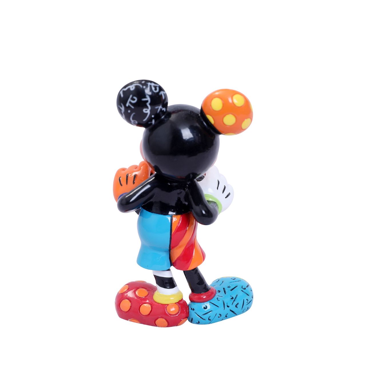 With a joyful smile, Mickey holds out a brightly painted heart to his beloved Minnie. Mickey is rocking a gloriously diverse palette, thanks to a unique paint job by Romero Britto, a multi-talented Brazilian pop artist known for his vibrant colours.