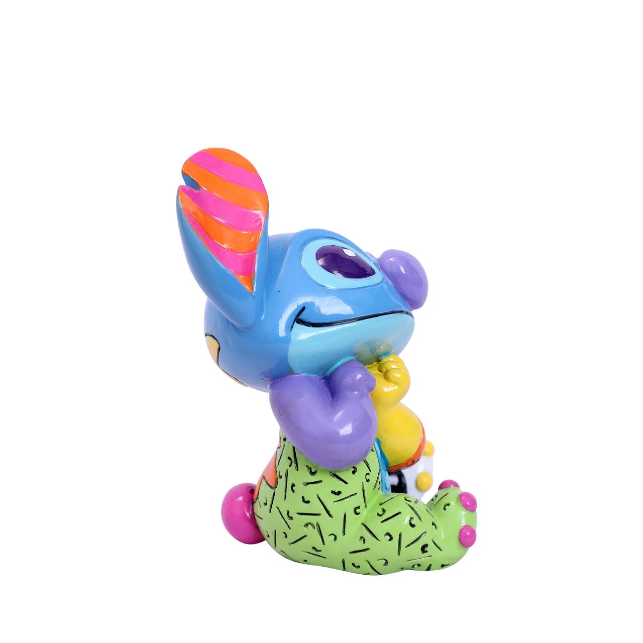 Experiment 626 was designed to be the ultimate bioweapon, but he discovered a gentler life after crash-landing in Hawaii and being adopted by a little girl named Lilo. Stitch's blue fur has taken on a vivid array of colours as designed by Romero Britto.