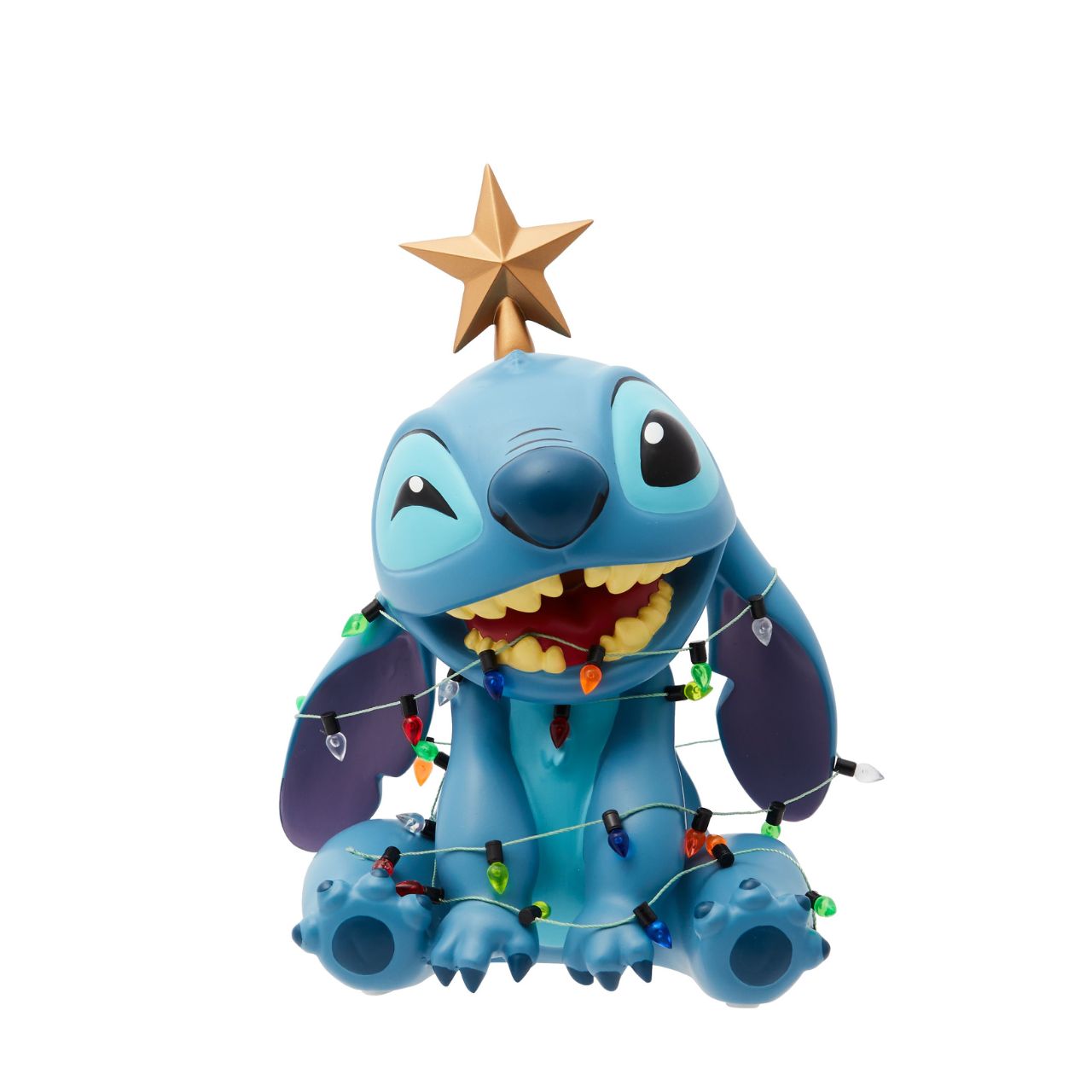 The Christmas Stitch Figurine by Disney Showcase is a fantastic gift for lovers of Disney. Standing 19cm tall with a star on top of his head and a string of Christmas lights around his body, this Stitch figurine is a delightful display piece that will be admired by all those who see it. 