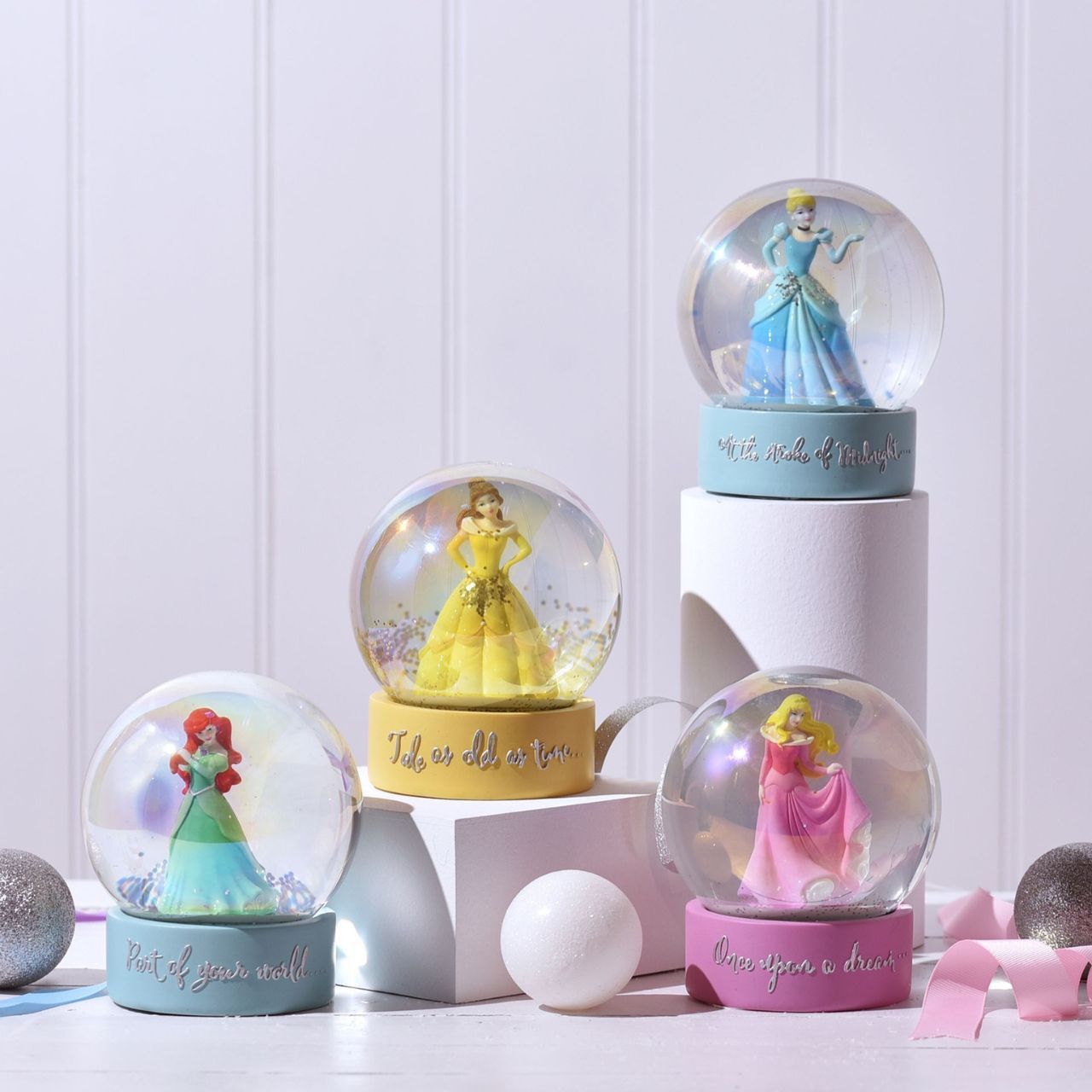 This fun Disney Snowglobe features a beautiful Cinderella figurine and blue glitter, as well as the phrase 'At the Stroke of Midnight' featuring in both silver lettering and a gorgeous font. This would be an amazing stocking filler for any little Cinderella fans in your life.