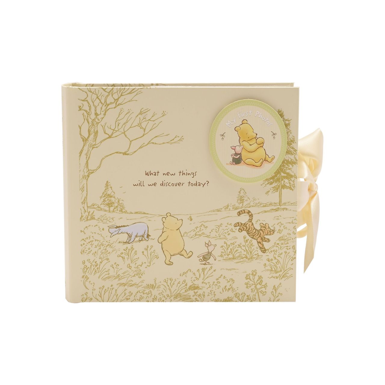 Disney Classic Pooh Heritage Photo Album Box My First Photos  This Winnie the Pooh keepsake photo album has been designed to reflect E.H. Shepard's original illustrations from the original A. A. Milne books, to be cherished for many years. Includes 80 photo sleeves.