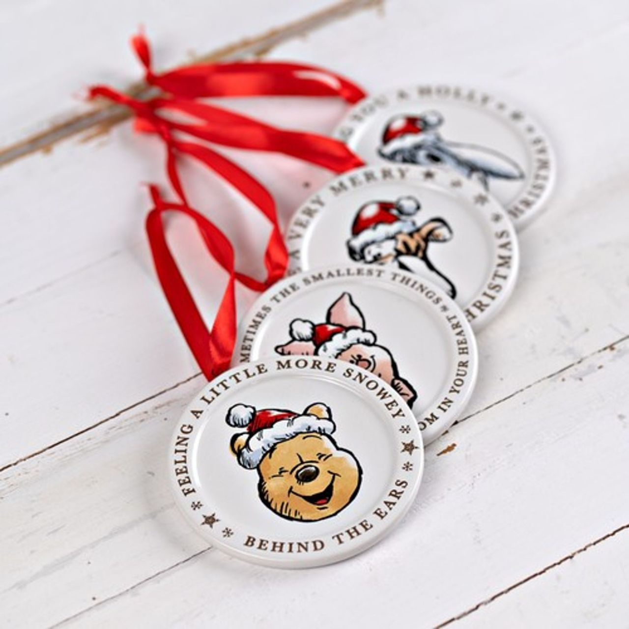 Disney Eeyore Christmas Ceramic Decoration  This delightful Christmas decoration is sure to bring some joy to any Disney fan's tree this year. A perfect ornament for a family home, make little one's Christmas a little more special this year with Eeyore.