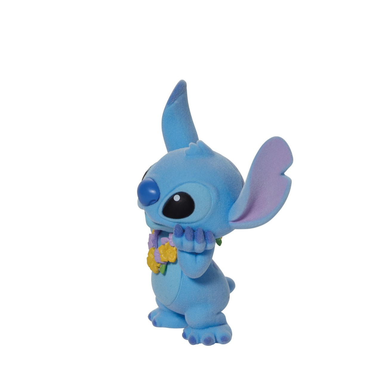 This super cute Stitch is dressed in a pretty lei, ready to get in the party mood. What makes him even more special is that this Stitch is flocked, which makes him fuzzy to touch. Disney's favourite alien is the perfect addition to any collection and this one is sure to make an impact wherever he goes. Comes in fully branded window box.