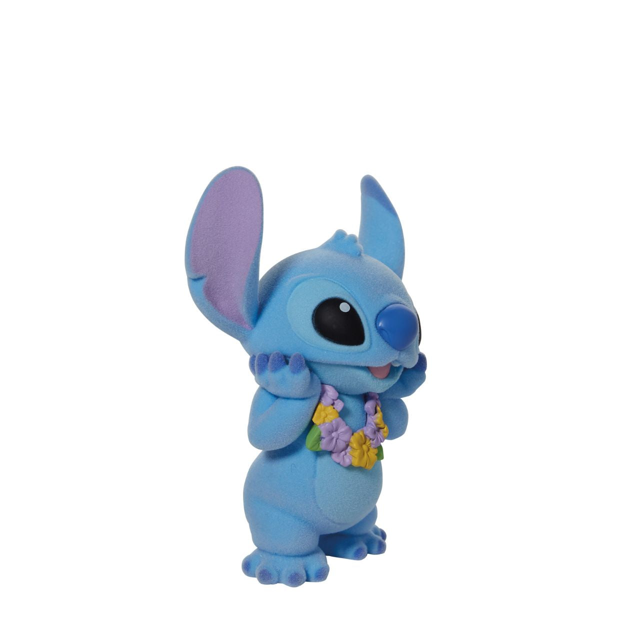 This super cute Stitch is dressed in a pretty lei, ready to get in the party mood. What makes him even more special is that this Stitch is flocked, which makes him fuzzy to touch. Disney's favourite alien is the perfect addition to any collection and this one is sure to make an impact wherever he goes. Comes in fully branded window box.