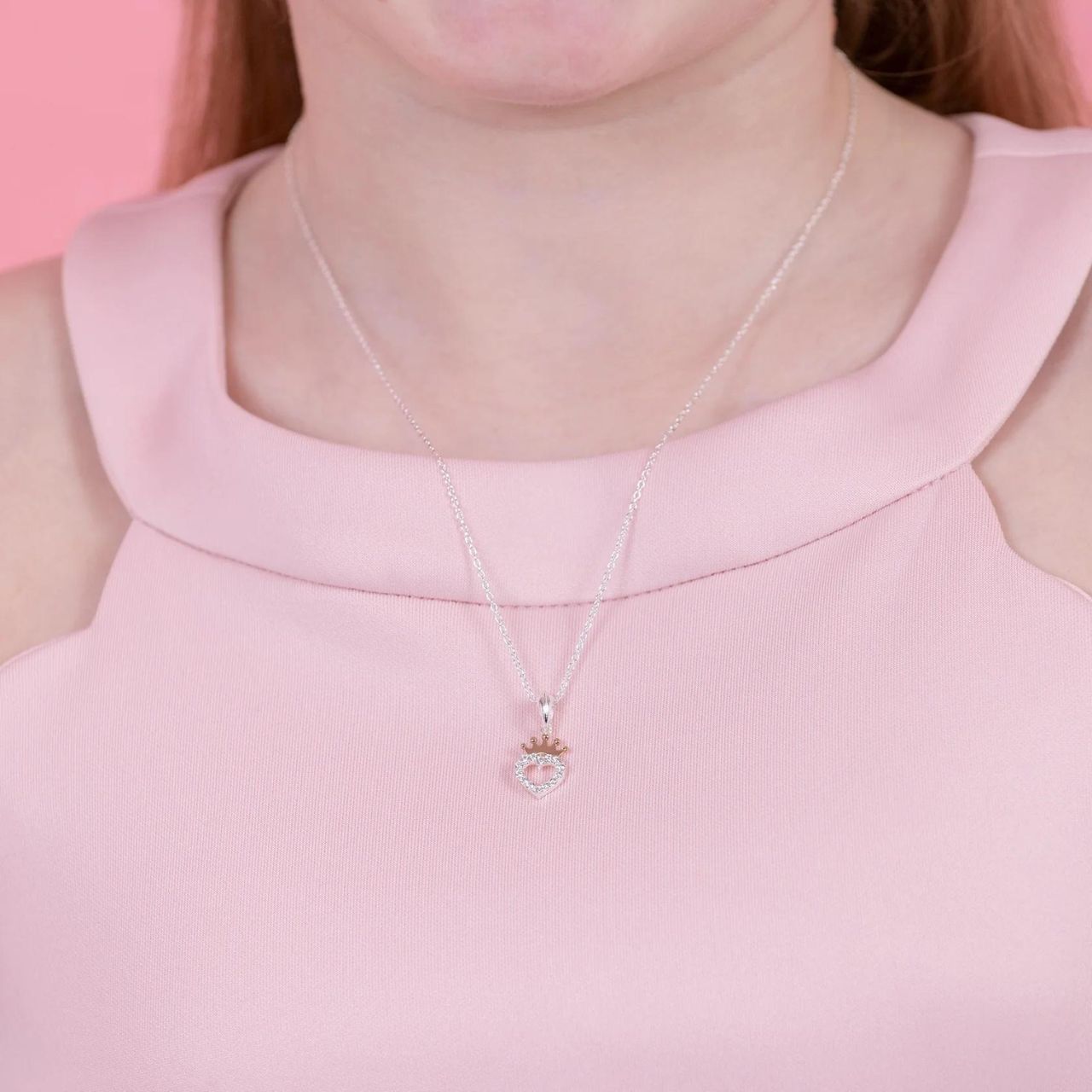 This official Disney Princess sterling silver crown heart pendant necklace is the perfect gift for any Disney fan.