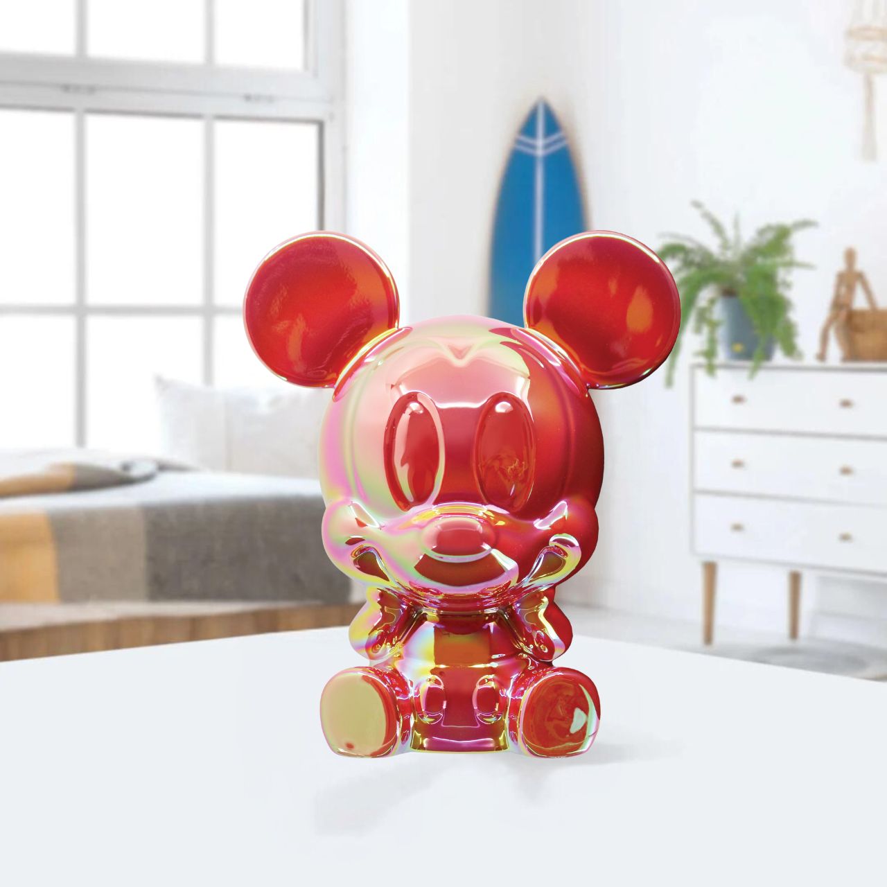 Make saving fun with the Mickey Ceramic Money Bank by Disney Showcase. It is the perfect, practical décor piece for Disney fans of all ages. At 17cm tall with a dazzling red, iridescent finish this piece is guaranteed to catch the attention of all that see it and will add the Disney magic to any home.