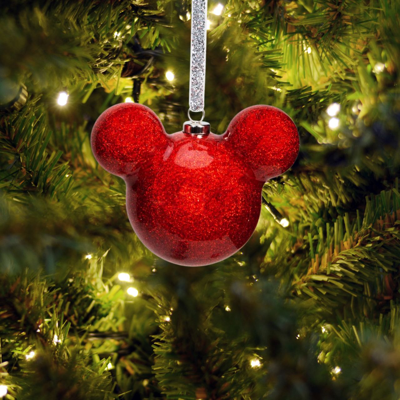 Bring some of Disney's magic to the festivity with this wonderful 6cm red glitter Mickey Mouse bauble.