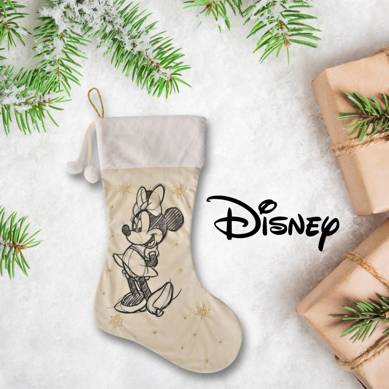 This Disney stocking would look beautiful hanging on any mantel this Christmas morning. With cute pompom detailing, a delightful print of Minnie Mouse, and a golden star design, this stocking is sure to brighten any Disney fan's day.