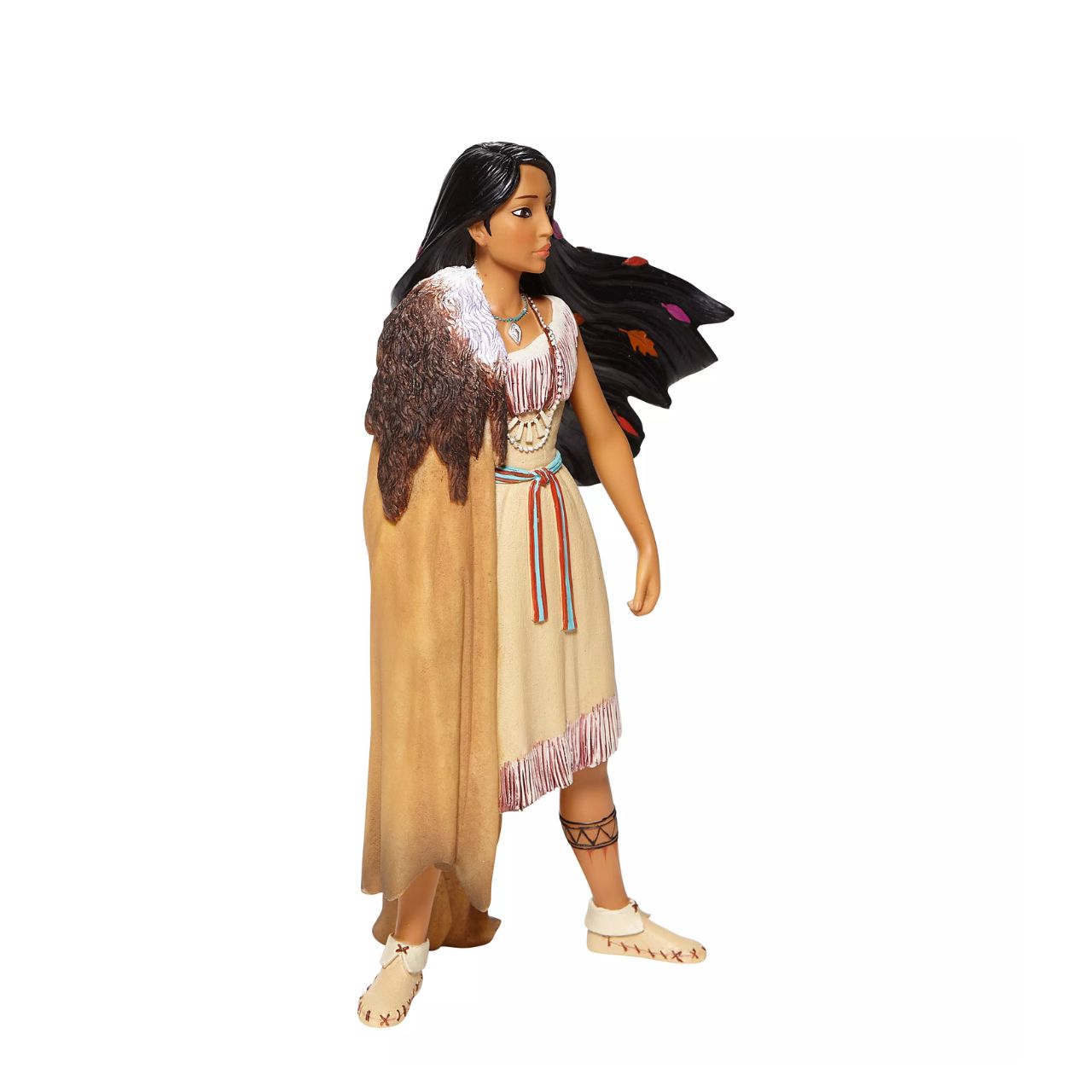 Pocahontas, daughter of Chief Powhatan of the Virginian native American tribe, strikes a powerful pose in this captivating Disney statuette. With colours in her hair and moccasins on her feet, she is a vision of beauty and female capability.