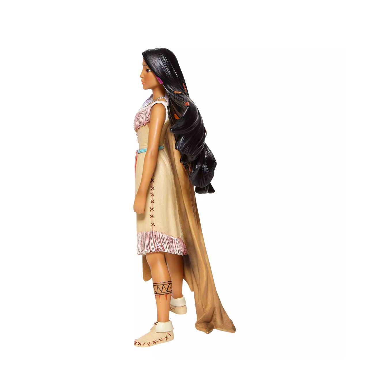 Pocahontas, daughter of Chief Powhatan of the Virginian native American tribe, strikes a powerful pose in this captivating Disney statuette. With colours in her hair and moccasins on her feet, she is a vision of beauty and female capability.