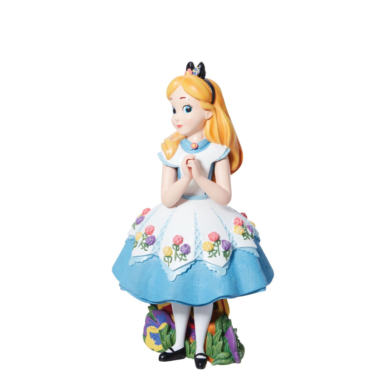 Celebrate Alice in Wonderland with Alice as she's never been seen before. Part of the Disney Showcase collection, Alice is the talk of Wonderland in her fashion-forward tea party dress. Her dress includes linen textures, iridescent paints, and sculpted 3D flowers to complete the look.