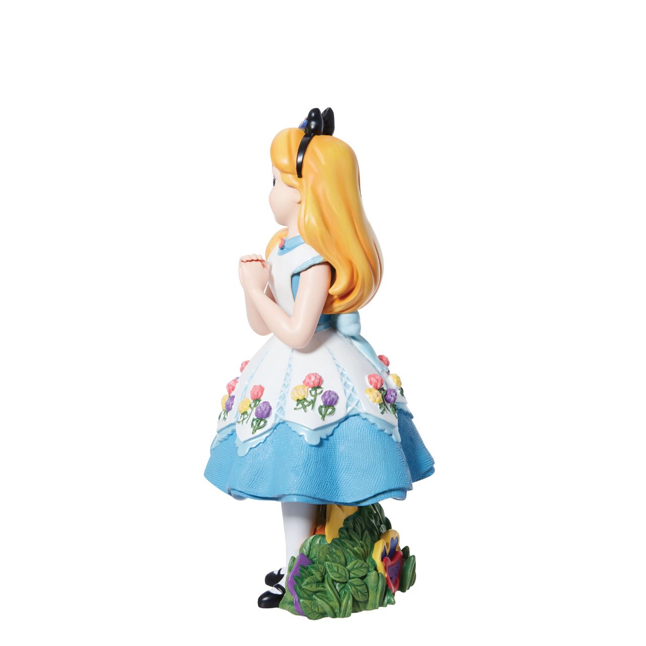 Celebrate Alice in Wonderland with Alice as she's never been seen before. Part of the Disney Showcase collection, Alice is the talk of Wonderland in her fashion-forward tea party dress. Her dress includes linen textures, iridescent paints, and sculpted 3D flowers to complete the look.