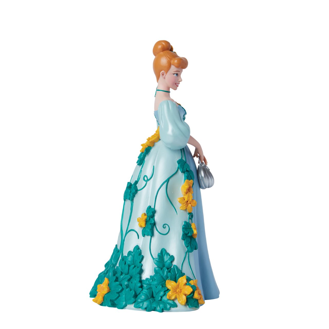 Part of the Disney Showcase Botanical collection, the Botanical Cinderella figurine sees Disney's iconic princess in her trademark blue ball gown adorned with bright yellow flowers and swirling green vines. Holding her silver pumpkin shaped handbag, she's ready to meet her Prince Charming.