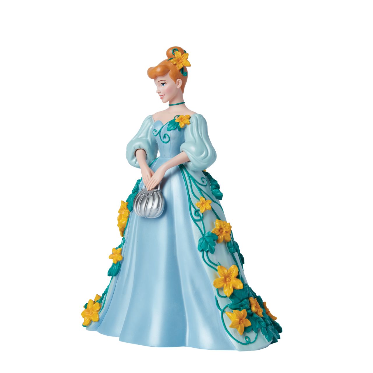 Part of the Disney Showcase Botanical collection, the Botanical Cinderella figurine sees Disney's iconic princess in her trademark blue ball gown adorned with bright yellow flowers and swirling green vines. Holding her silver pumpkin shaped handbag, she's ready to meet her Prince Charming.