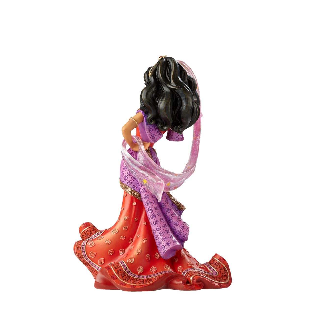 Making her debut into Disney Showcase is the finest girl in France, Esmeralda from the classic film Hunchback of Notre Dame. This stunning twentieth anniversary cast stone figurine depicts Esmeralda in her red dress and shimmering star scarf; the fluidity and movement of the fabrics have been perfectly captured.