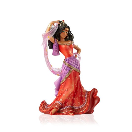 Making her debut into Disney Showcase is the finest girl in France, Esmeralda from the classic film Hunchback of Notre Dame. This stunning twentieth anniversary cast stone figurine depicts Esmeralda in her red dress and shimmering star scarf; the fluidity and movement of the fabrics have been perfectly captured.