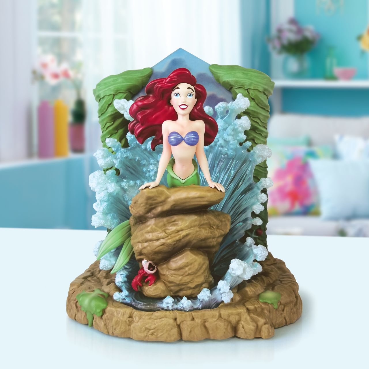 The Little Mermaid light up figurine. The figurine is made from cast stone. Each piece is hand painted and slight colour variations are to be expected which makes each piece unique. Supplied in branded gift box. 