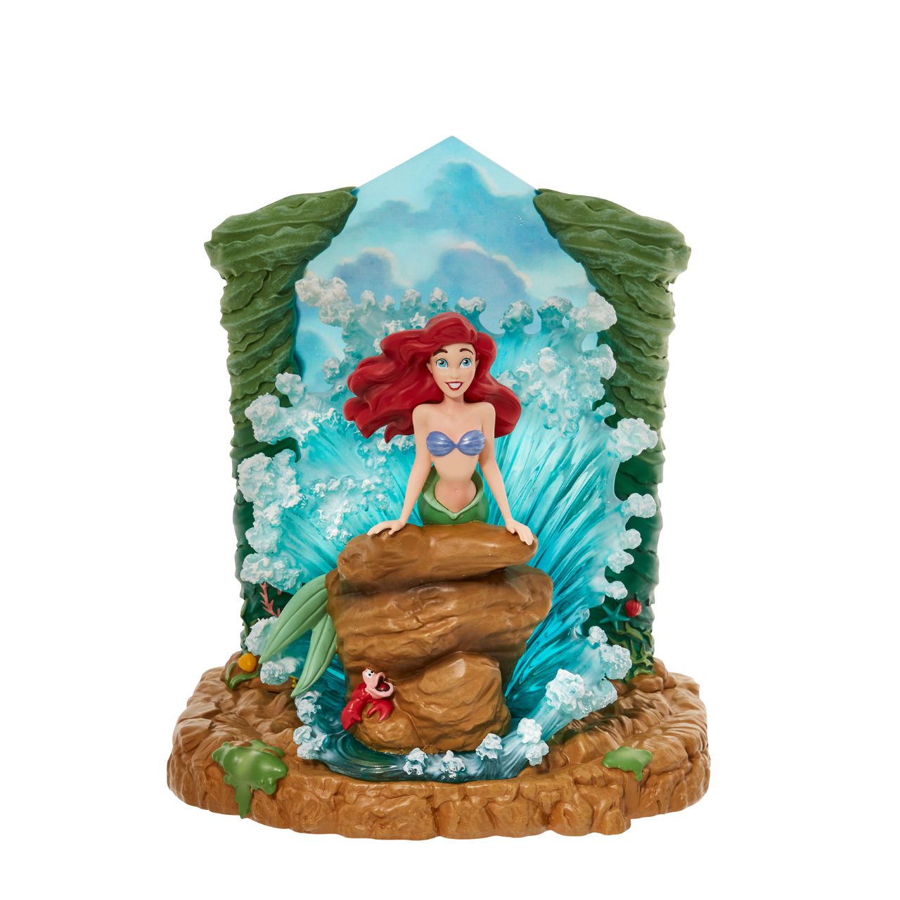 The Little Mermaid light up figurine. The figurine is made from cast stone. Each piece is hand painted and slight colour variations are to be expected which makes each piece unique. Supplied in branded gift box. 