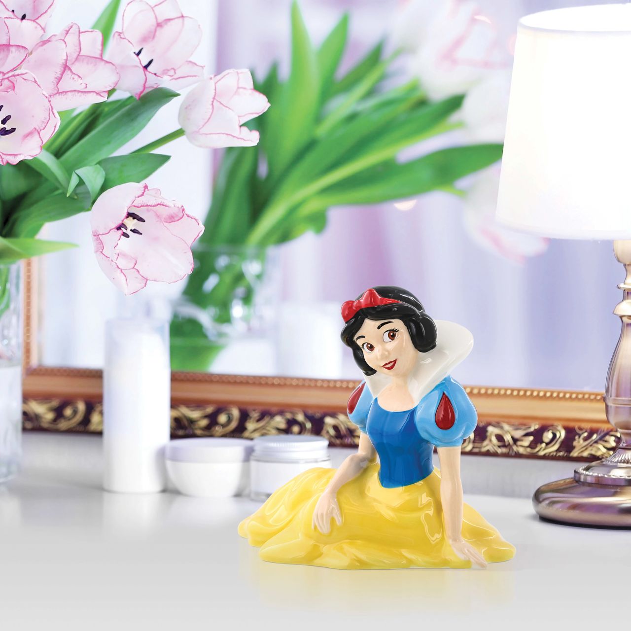 Discover the Disney Snow White Money Bank, where every coin tells a fairy tale. Adorned with Snow White's timeless grace, this bank invites you to save for magical moments. Let her kindness and optimism accompany your savings journey with a touch of Disney enchantment.