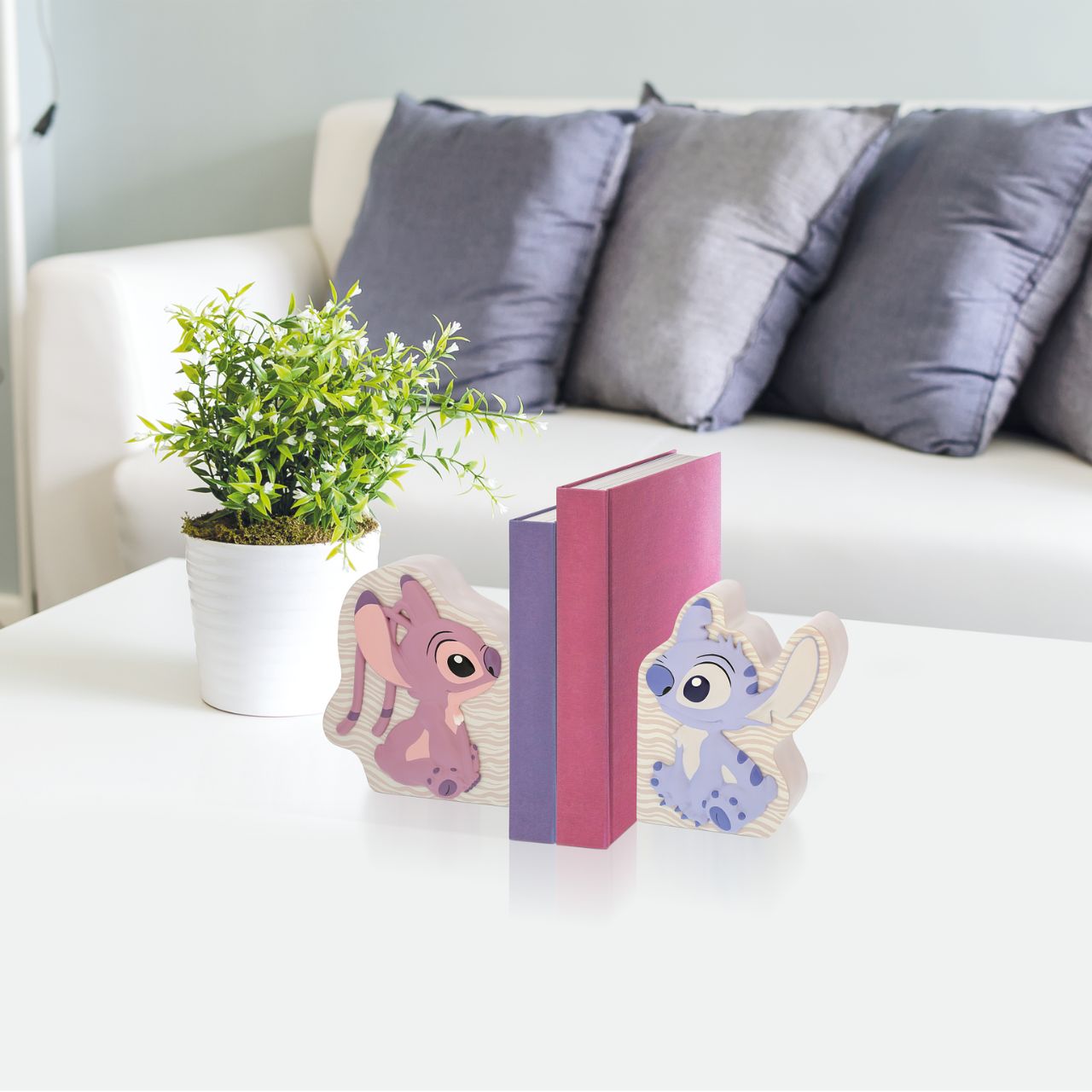 Let Stitch and Angel guard your tales. Introducing Disney's Stitch and Angel Bookends. These adorable characters create a delightful scene while showcasing your favourite stories. Add a touch of mischief and love to your shelves with these charming bookends.