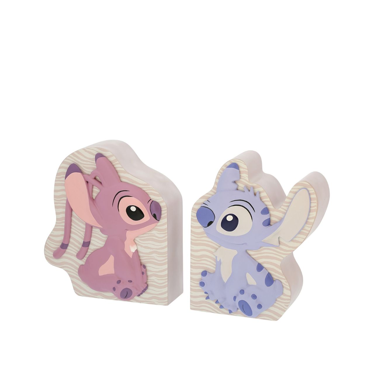 Let Stitch and Angel guard your tales. Introducing Disney's Stitch and Angel Bookends. These adorable characters create a delightful scene while showcasing your favourite stories. Add a touch of mischief and love to your shelves with these charming bookends.