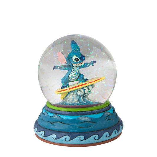 Stitch catches a wave inside your waterball! The Hawaiian adopted alien has learned a few things in his time on earth, among them playing the guitar and hanging ten. With striking form and colour, this Jim Shore design applauds the Disney film.