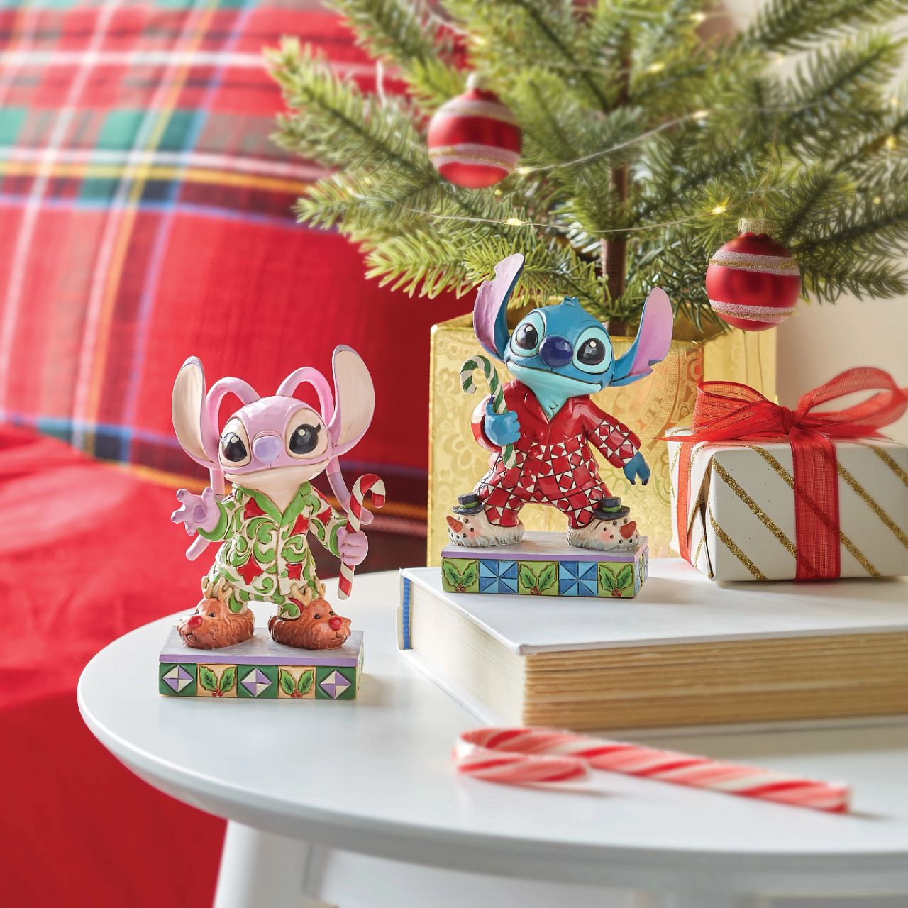 Stitch is ready for Christmas morning with his festive pjs - we wonder if Santa has visited him. Comes in a fully branded gift box from Disney Traditions.