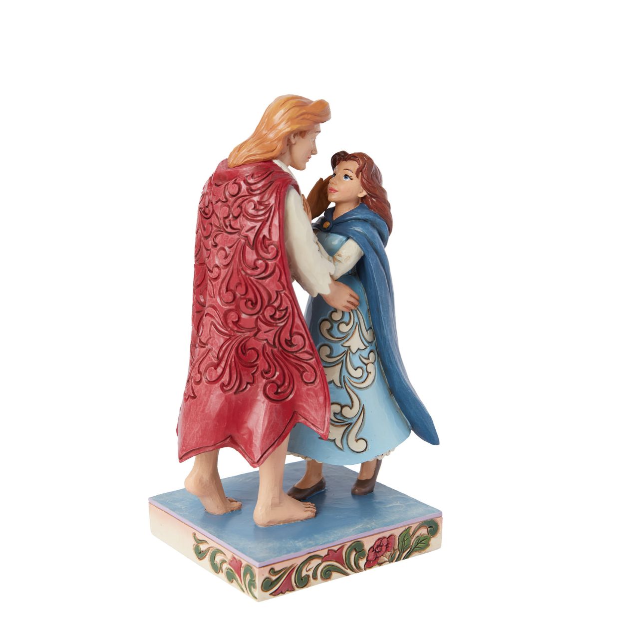 The iconic couple of Belle and her prince, just moments after he is turned back from the beast into a human. A perfect sentiment of love, no matter what. From the Disney Traditions collection.