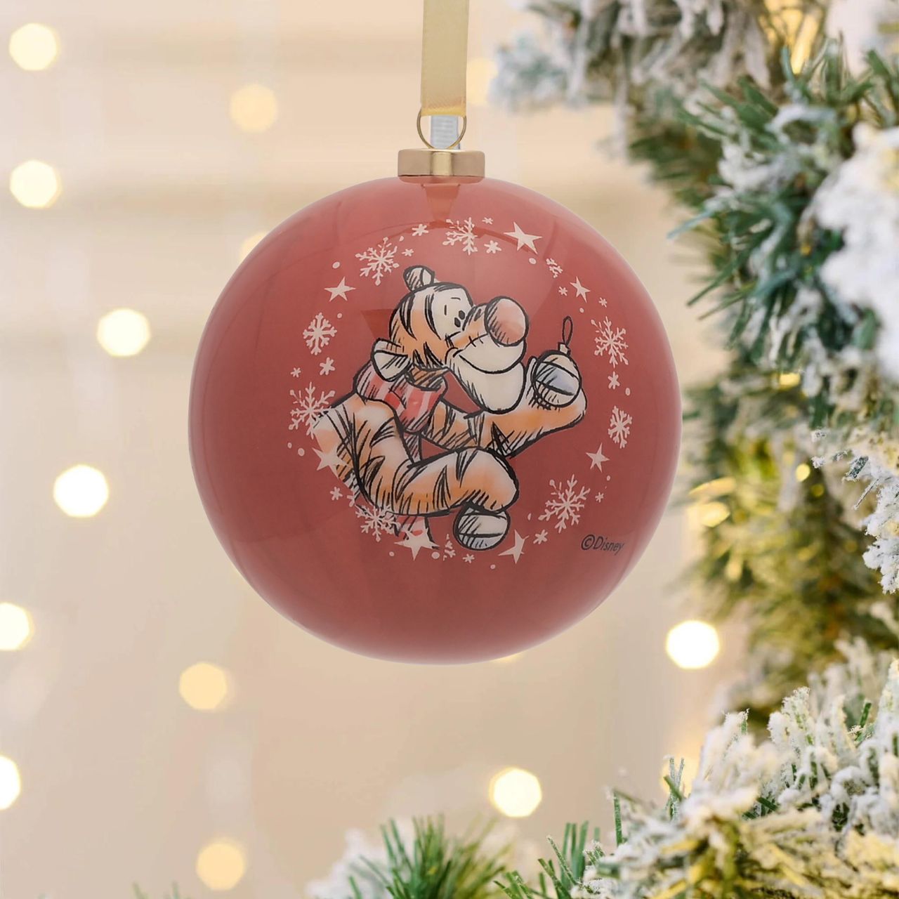 Disney Winnie the Pooh Set of 12 Christmas Baubles  A set of 12 Winnie the Pooh baubles by DISNEY.  These fun-filled decorations will hang proudly and brightly from the Christmas tree throughout December.