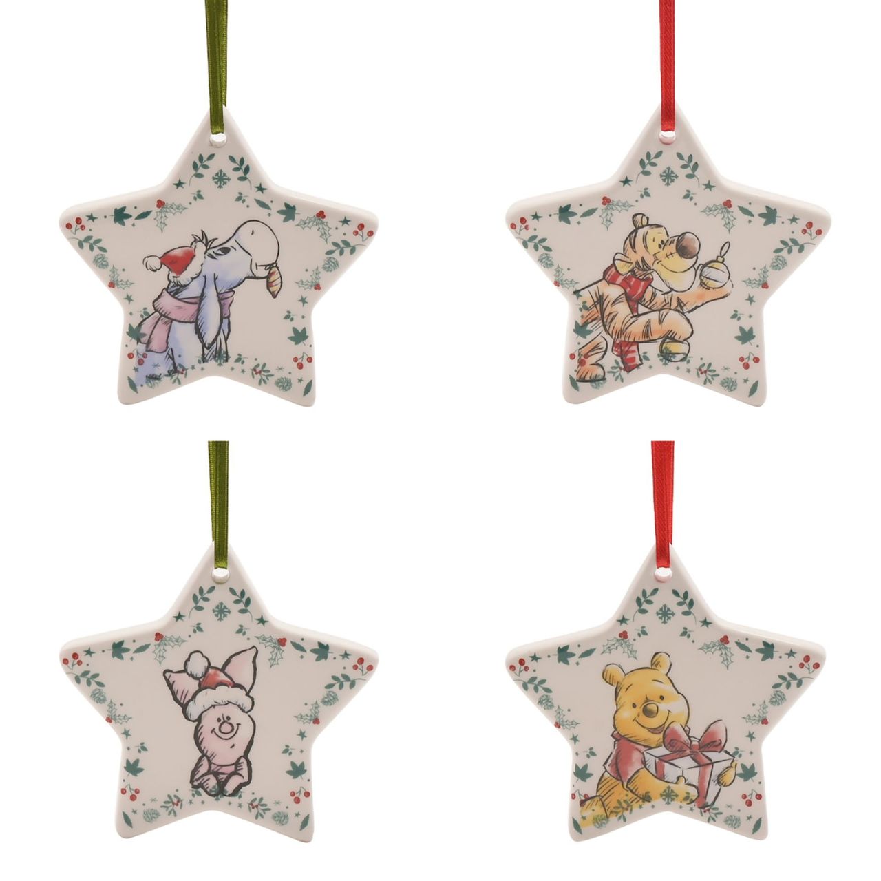 Disney Winnie the Pooh Christmas Decorations Set of 4 Ceramic  A set of 4 Winnie the Pooh ceramic decorations by DISNEY®.  These fun-filled decorations will hang proudly from the Christmas tree throughout December.